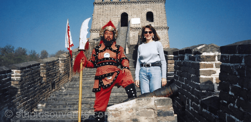 Standing on the great wall of china with am authentic looking great wall guard.