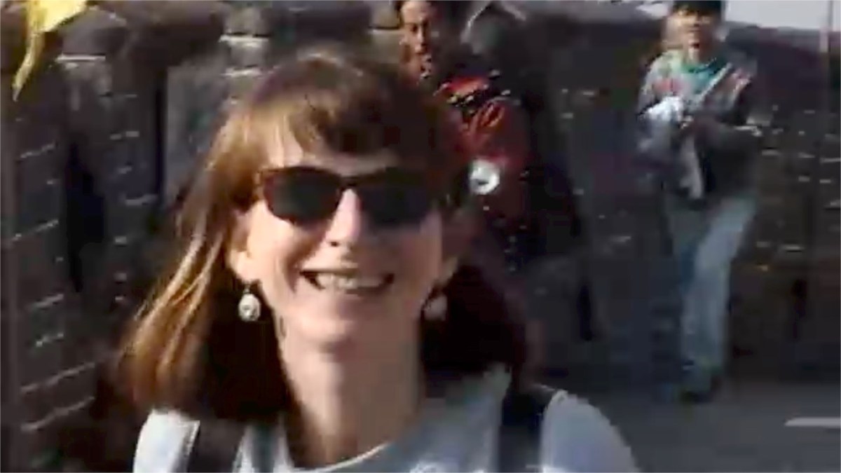 On the great wall of China trying to take a sneaky picture wit the pretend guard.